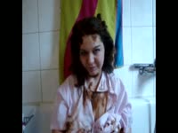 Chubby Romy smears hair with shit and piss